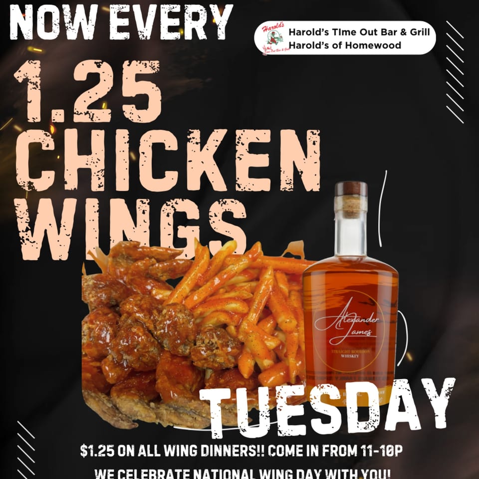 Harold's fried chicken wings and fries with a bottle of Alexander James Straight Bourbon Whiskey.